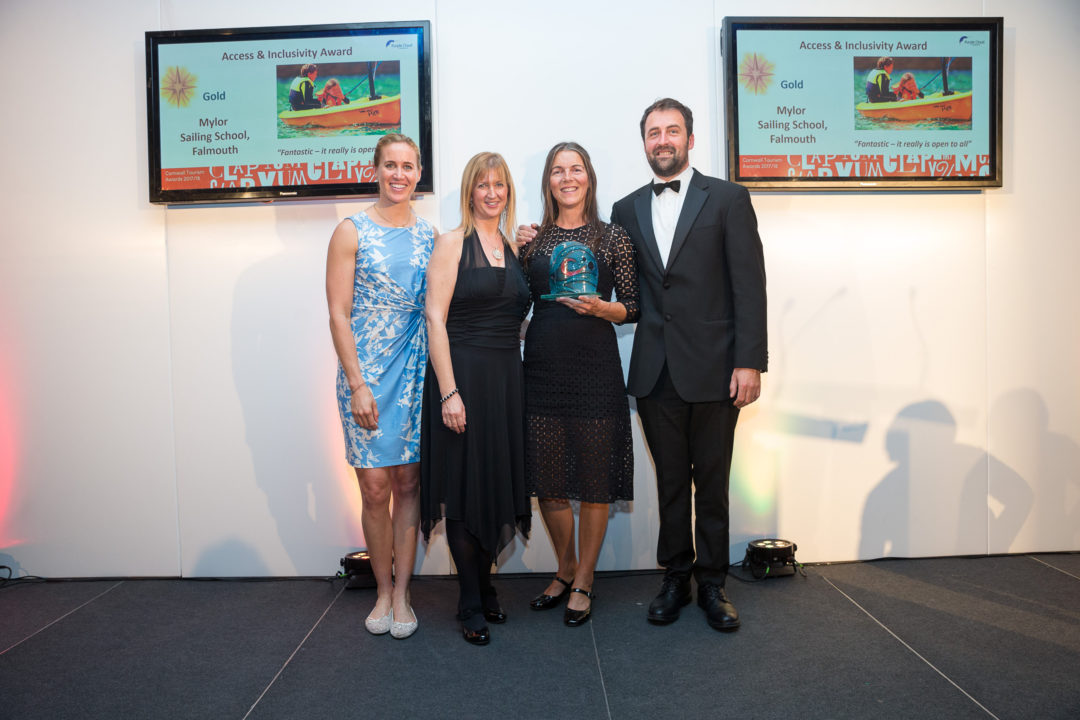 Helen Glover with owners of Mylor Sailing school collecting their GOLD award at the Cornwall Tourism Awards in November 2017