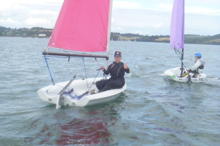 Girl sailing a Pico at Mylor Sailing School Falmouth Cornwall