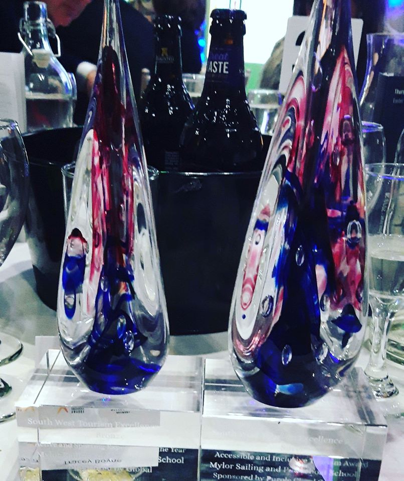 Two glass awards on the table