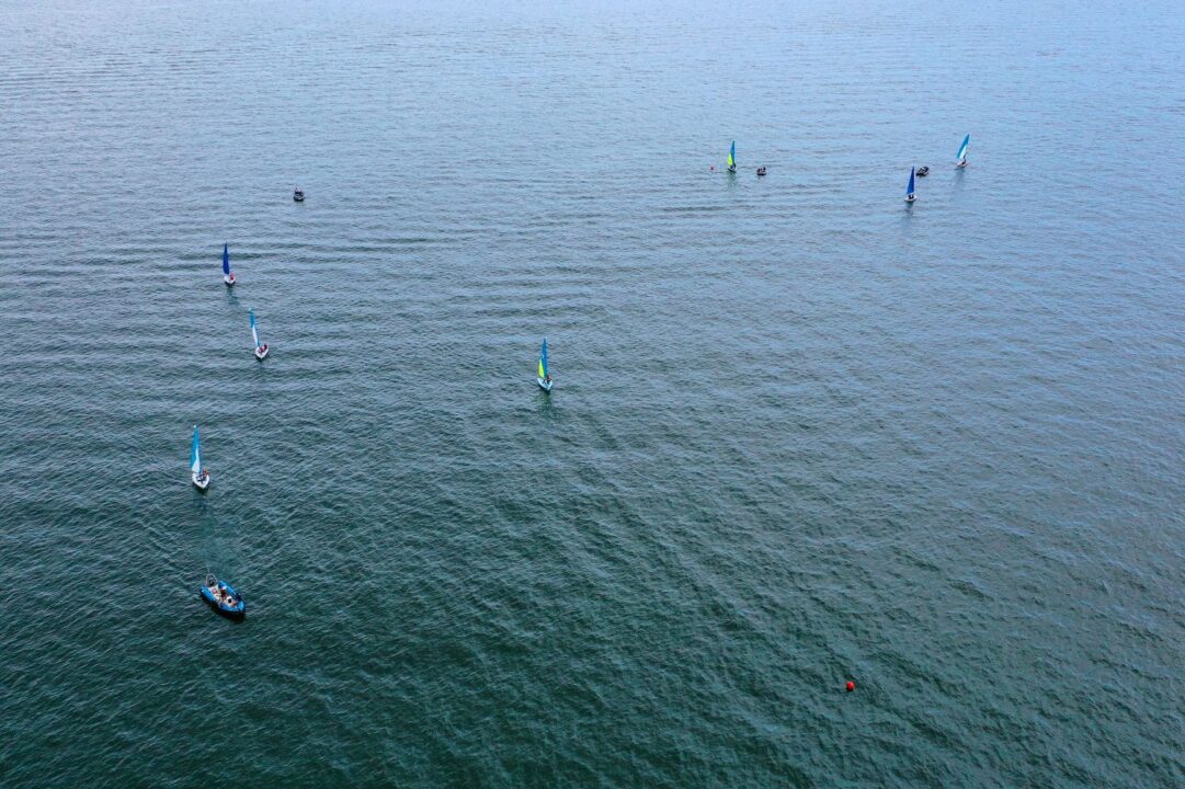 birds eye view of sailing dinghies on the water