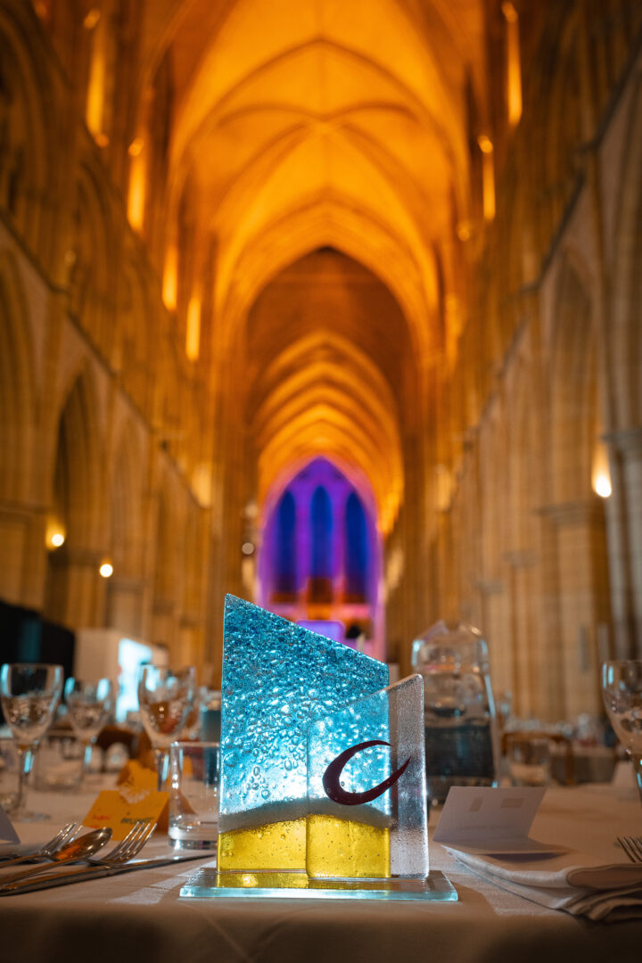 Truro cathedral back drop with a glass award in the fore ground